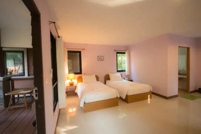 Bedroom in the Superior Garden Bungalow at Baantip Suantong Resort in Bang Khonthi — Gallery image 1